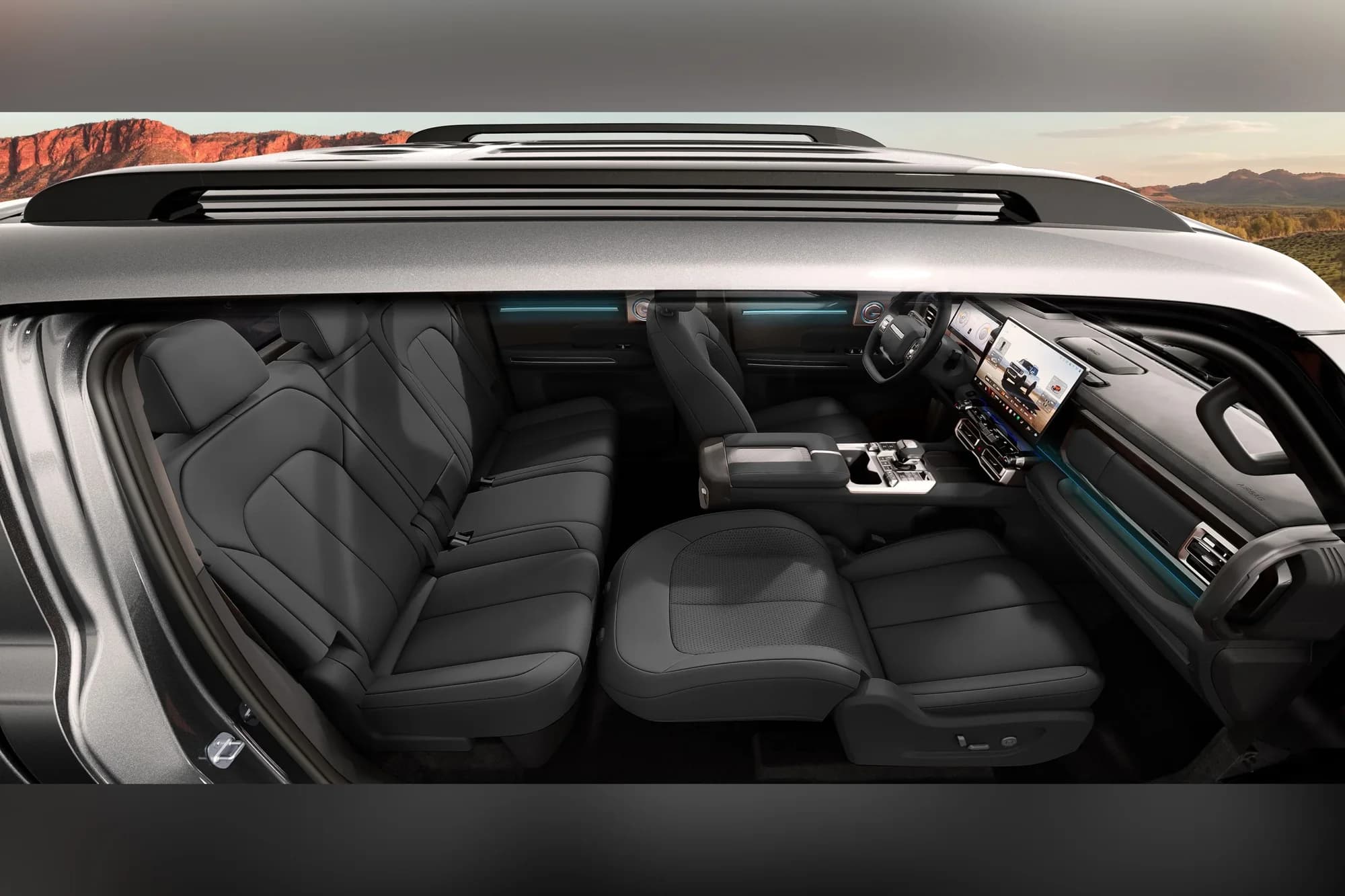 Chery Stockman interior showing the dashboard, large central touchscreen, ambient lighting and front seats