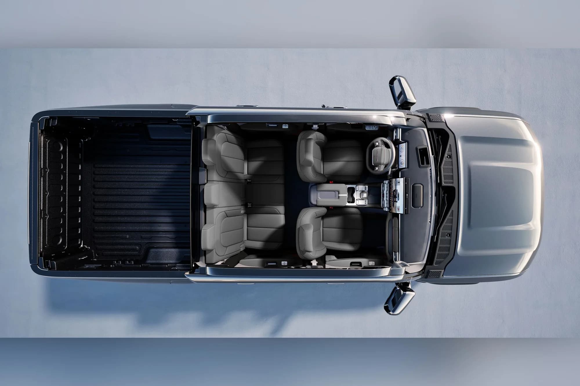 Chery Stockman overhead studio view showing the open tray, dual-cab interior layout and proportions