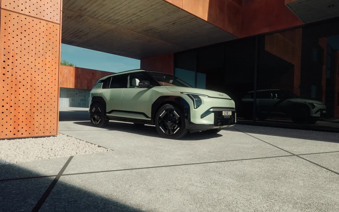 Kia EV3 front three-quarter in Matcha Green