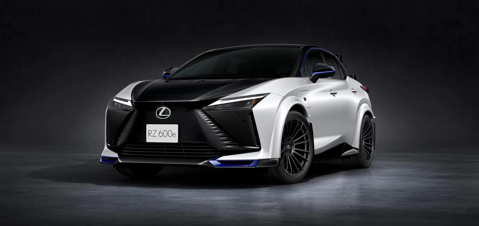Lexus RZ 600e F Sport Performance in white and black two-tone, front three-quarter view in a studio