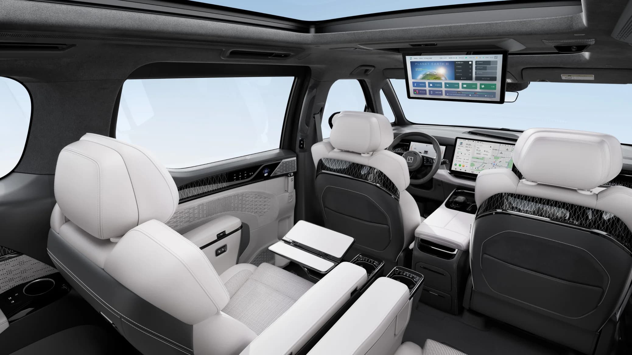 Zeekr 009 middle-row executive seats with fold-out tables and rear entertainment screen