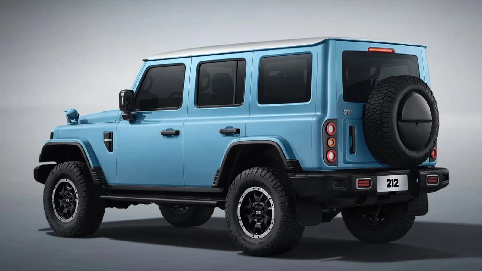 2026 212 T01 rear shot with full-size spare wheel cover and side-hinged tailgate
