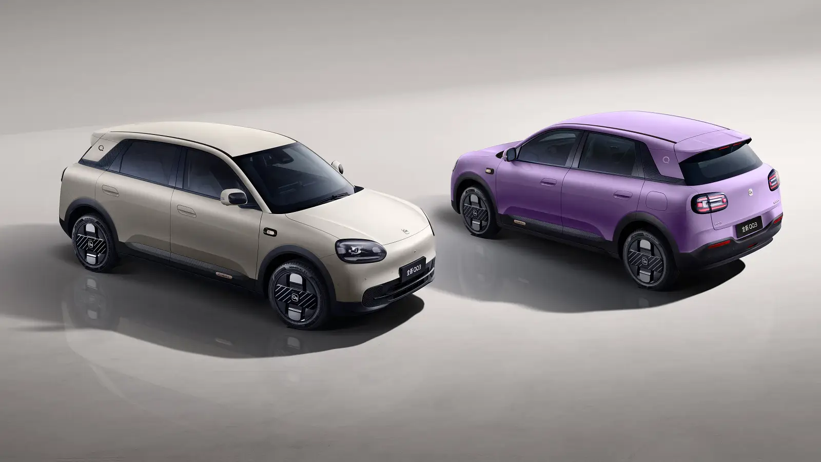 2027 Chery Q electric hatch shown in tan and lavender colours, studio shoot front and rear angles