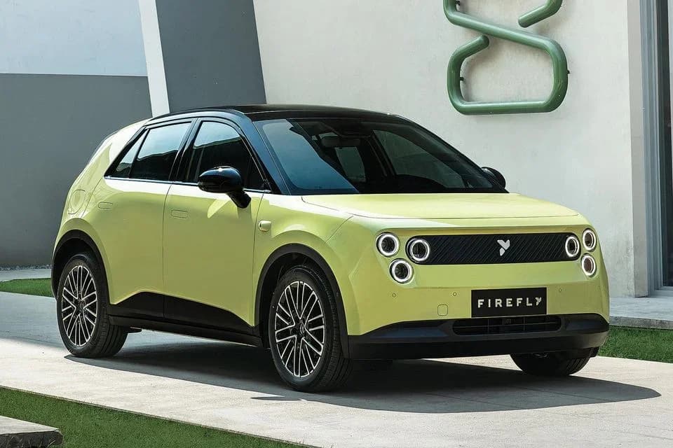 Firefly electric hatchback in yellow with black roof and signature triple-circle headlights