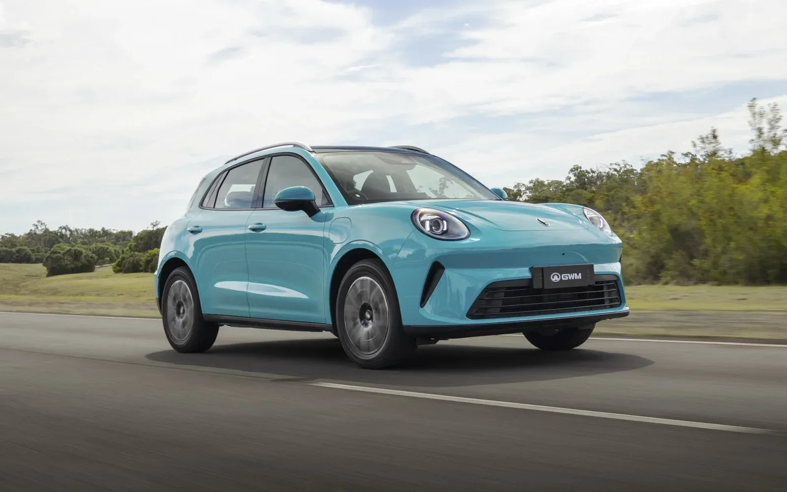 2026 GWM ORA 5 electric SUV in turquoise, front three-quarter driving shot