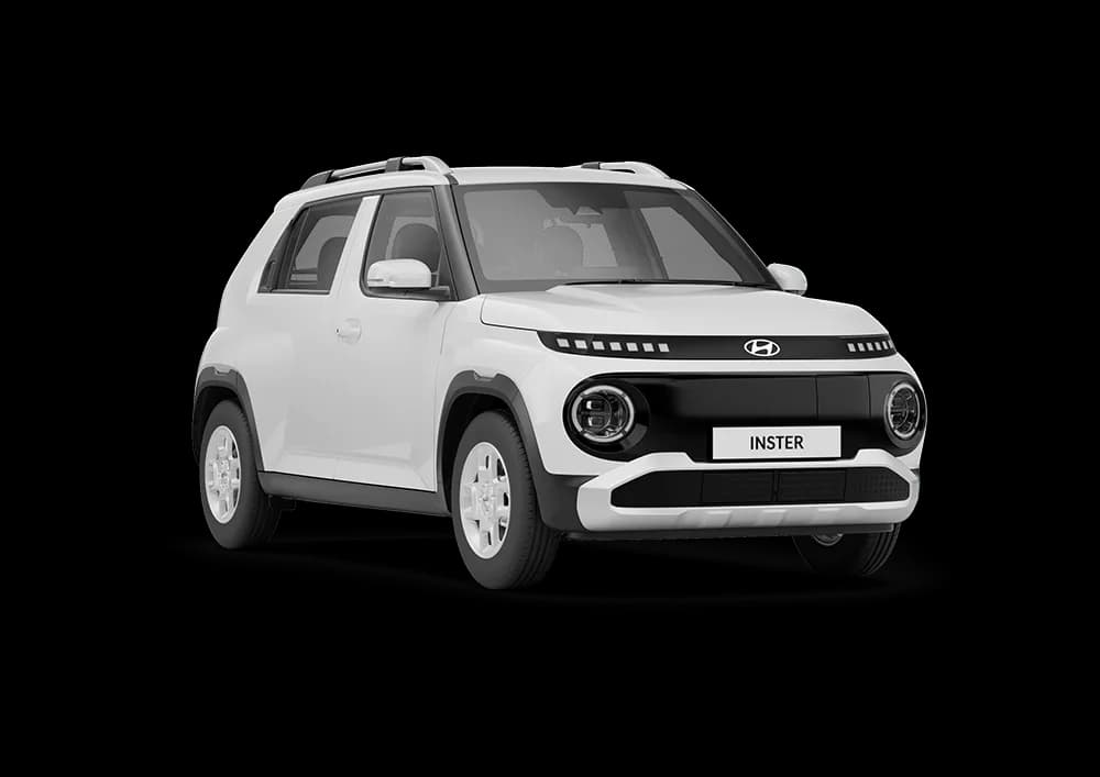 Hyundai Inster Standard Range in white, front three-quarter studio view
