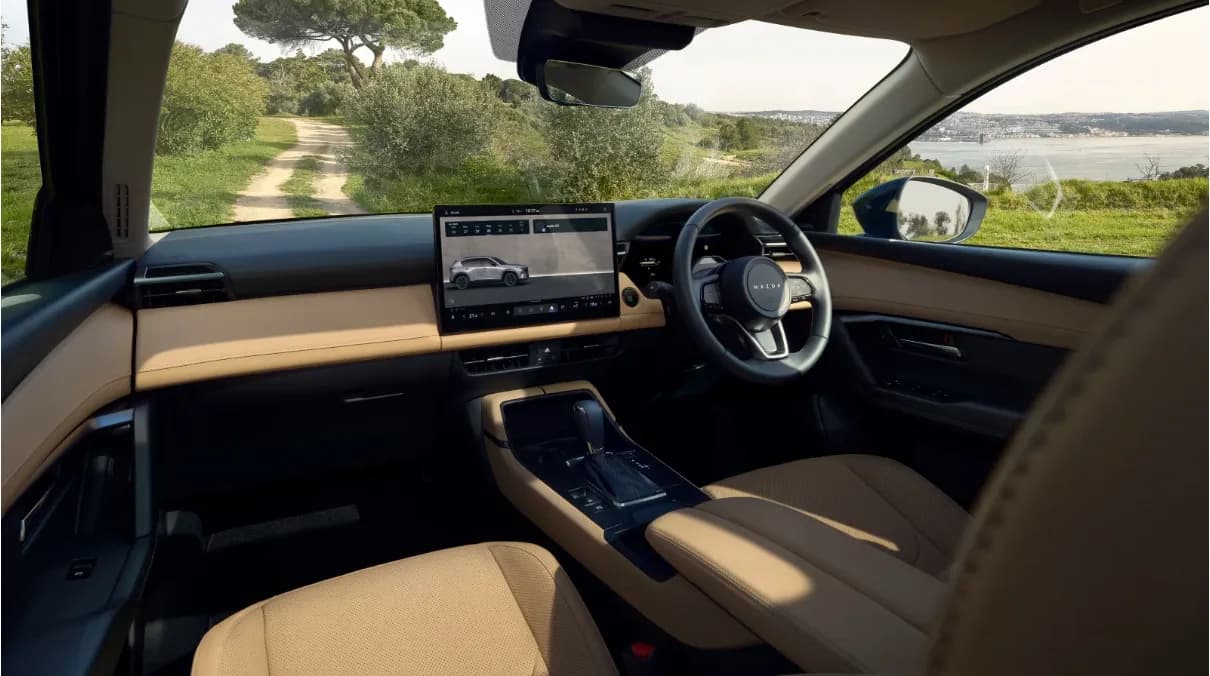 2026 Mazda CX-5 interior showing 12.9-inch screen and tan leather