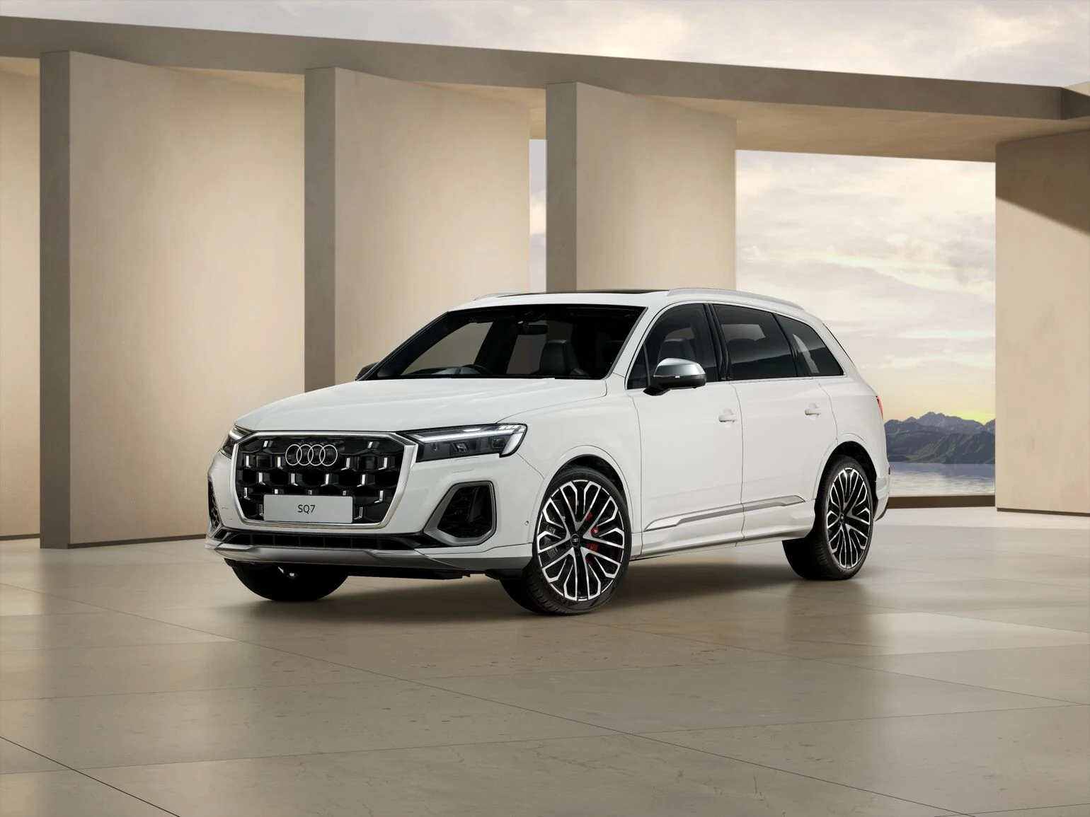 2026 Audi SQ7 TFSI quattro in Glacier White showing the front three-quarter design with 22-inch Audi Sport multi-spoke wheels