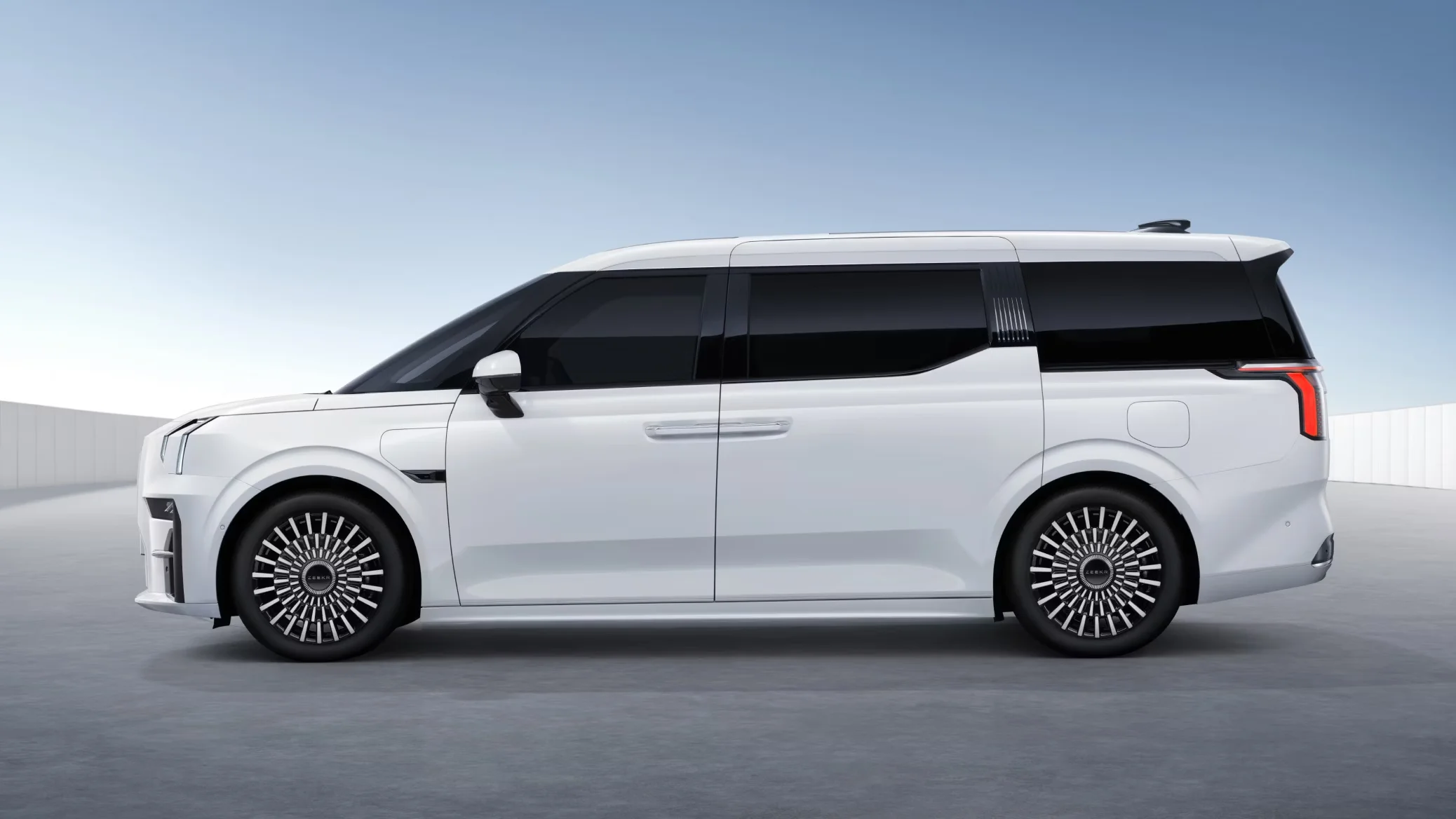 Zeekr 009 side profile showing rear-hinged sliding doors and aerodynamic silhouette