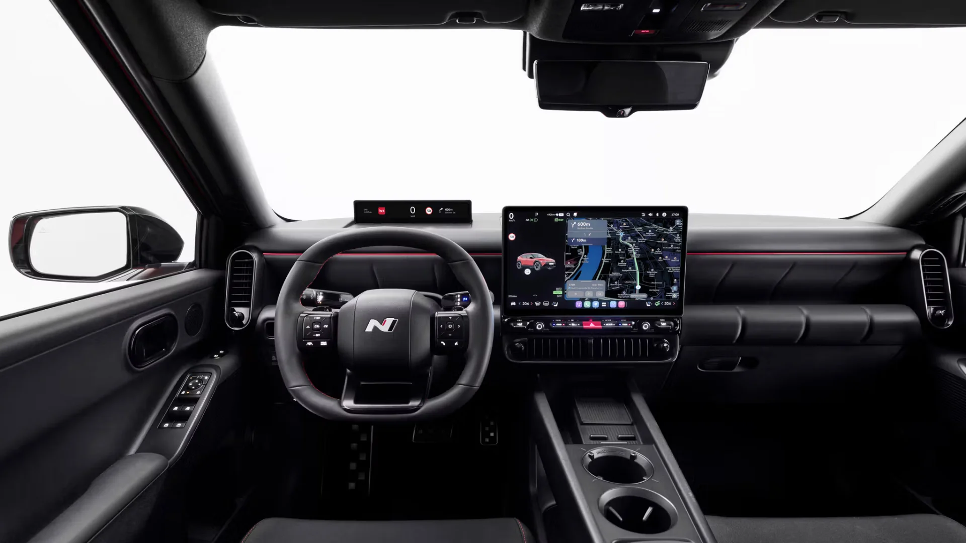2027 Hyundai Ioniq 3 N interior dashboard with Pleos infotainment touchscreen and N steering wheel