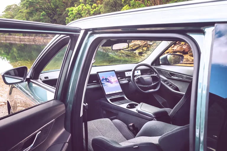2026 Jaecoo J5 petrol interior showing 13.2-inch central touchscreen and minimalist dashboard