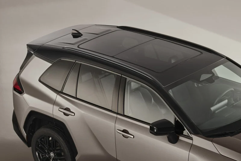 2026 Toyota RAV4 panoramic glass roof in tan with gloss black roof rails