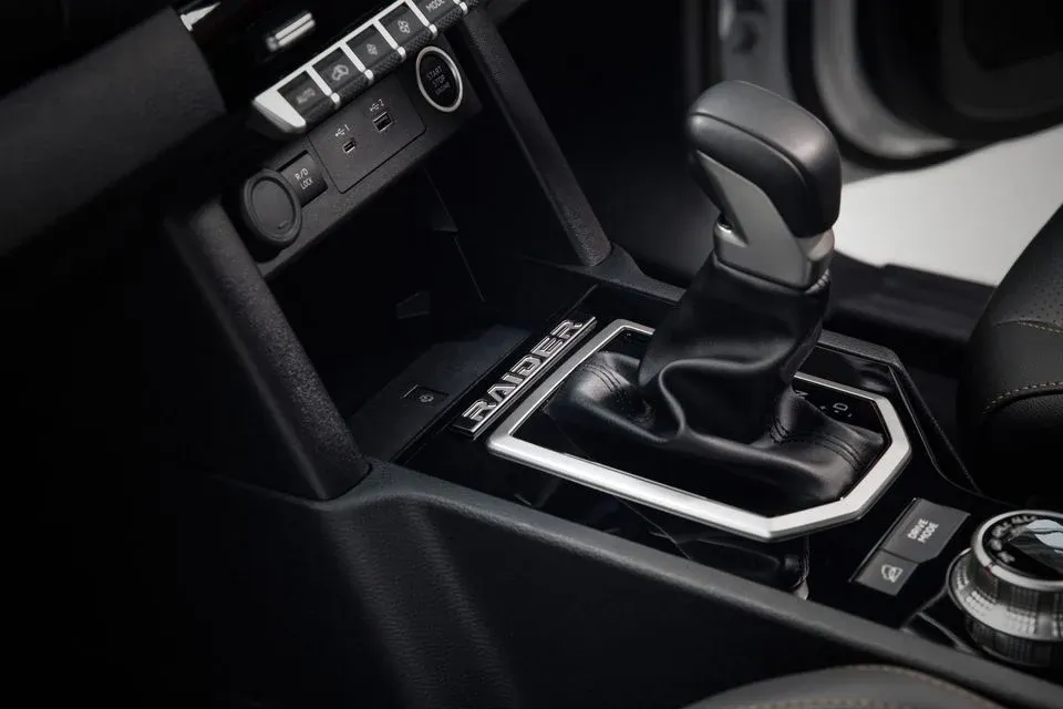 Triton Raider centre console badge detail