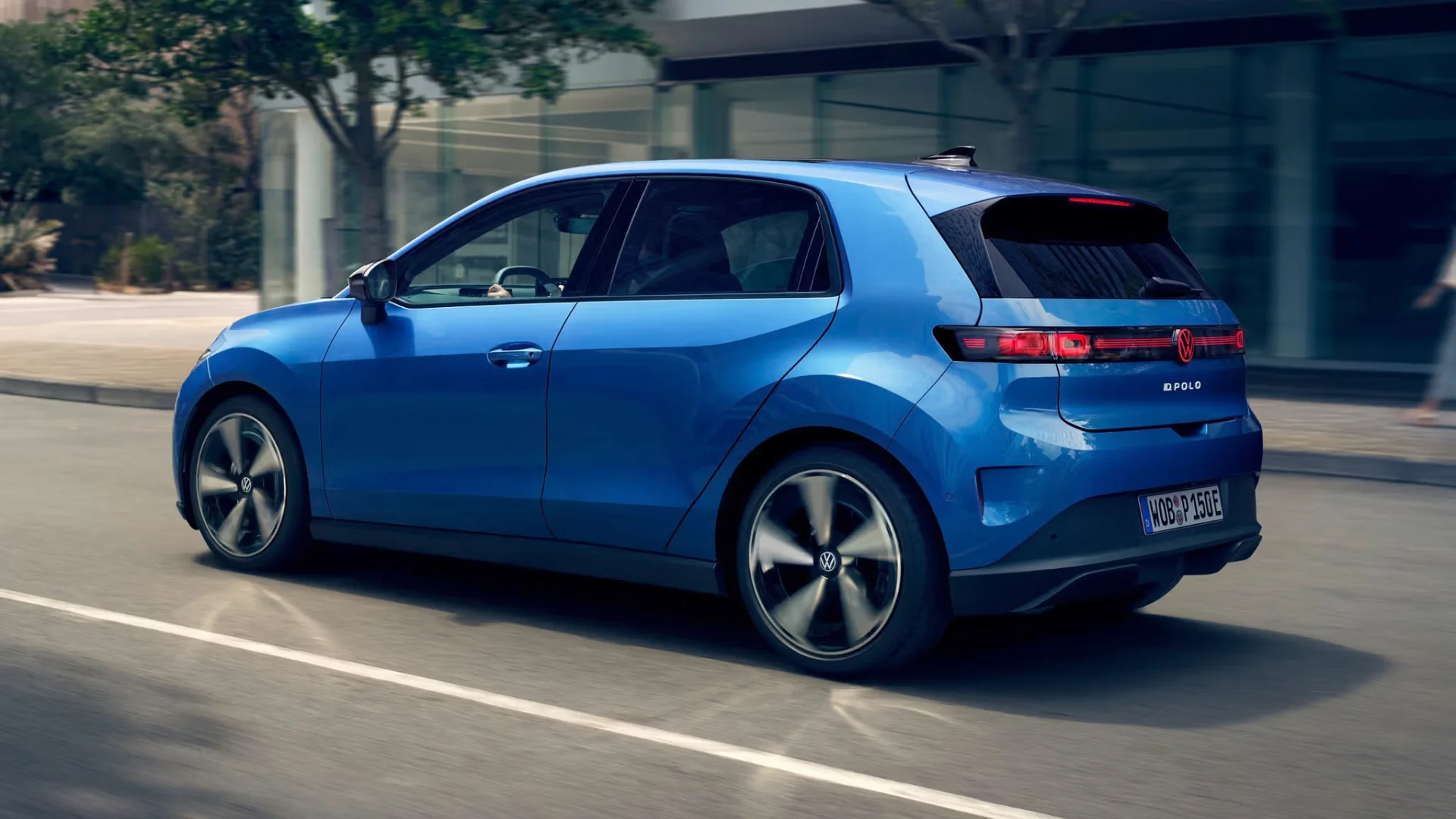 2026 Volkswagen ID. Polo electric hatchback rear three-quarter showing full-width LED tail light bar