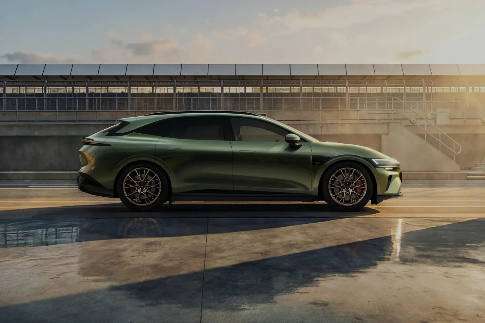 Zeekr 7GT green side profile on an elevated track